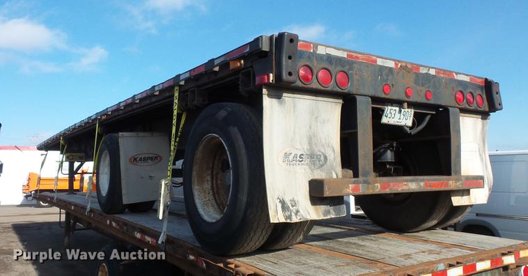 image for item DB8009 2002 Transcraft TL-2000-W2 flatbed trailer