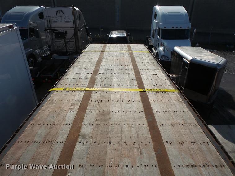 image for item DB8009 2002 Transcraft TL-2000-W2 flatbed trailer