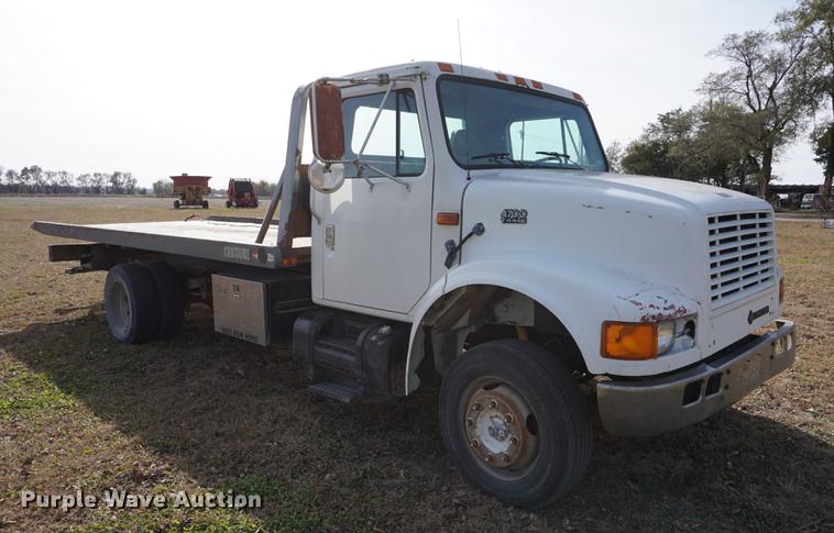 image for item DA1441 1997 International 4700 rollback truck