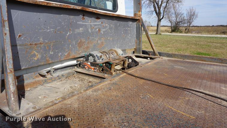 image for item DA1441 1997 International 4700 rollback truck