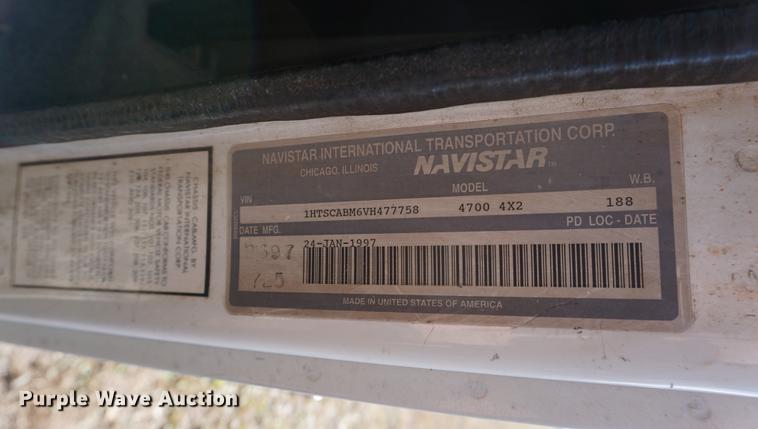 image for item DA1441 1997 International 4700 rollback truck