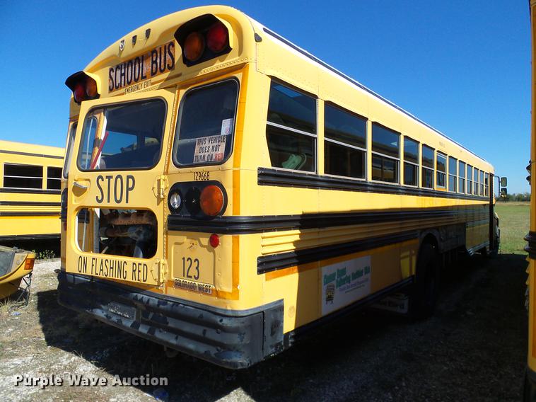 image for item DC7980 1999 GMC Blue Bird bus