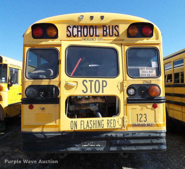 image for item DC7980 1999 GMC Blue Bird bus