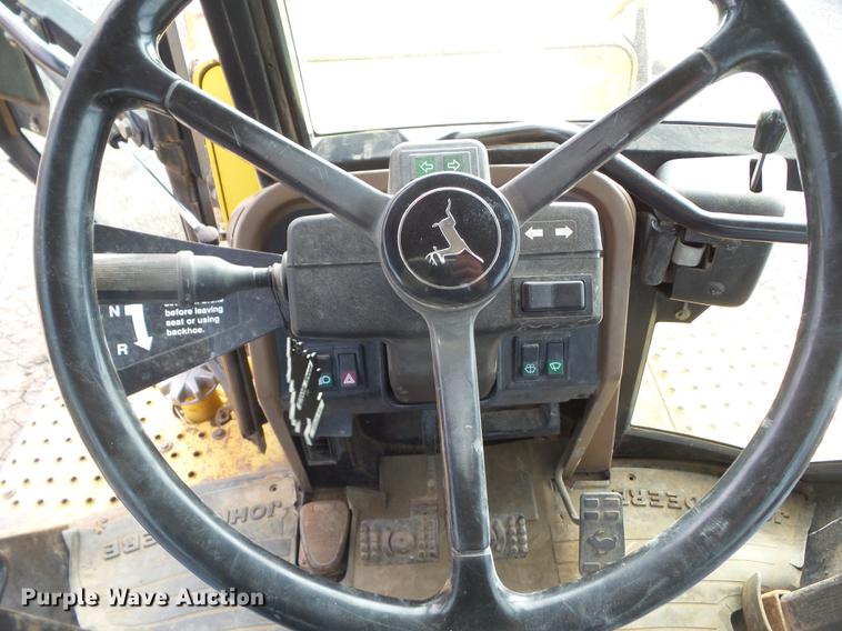 image for item DA7009 1995 John Deere 710D backhoe