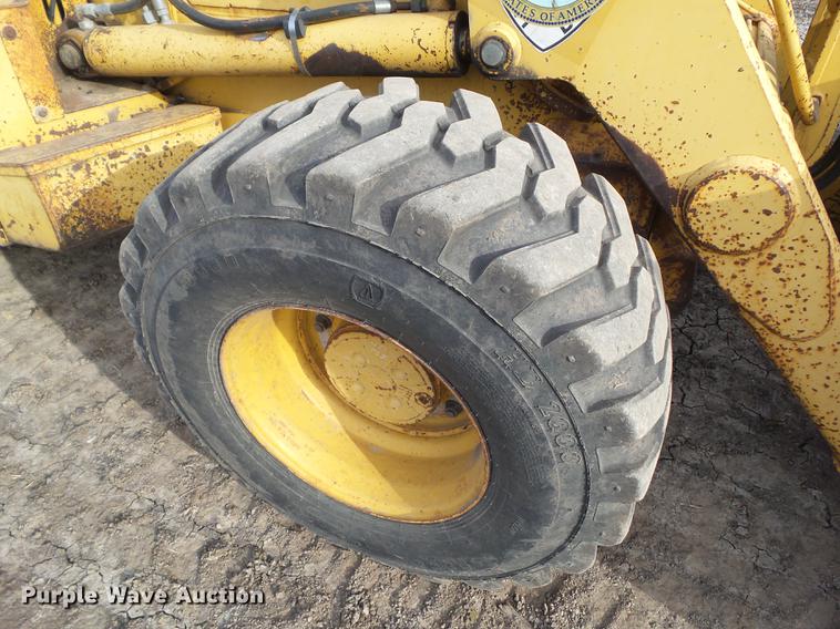 image for item DA7009 1995 John Deere 710D backhoe