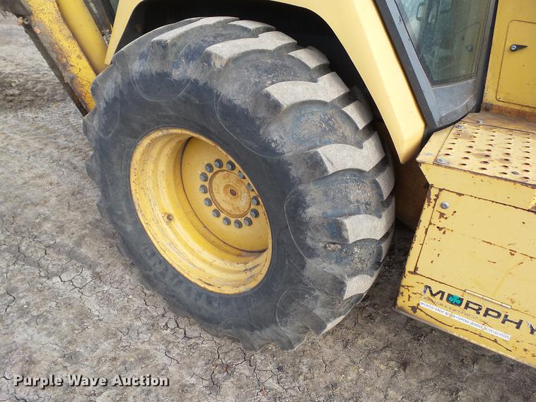 image for item DA7009 1995 John Deere 710D backhoe