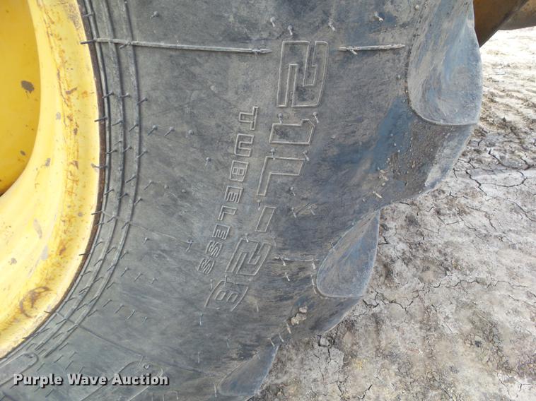 image for item DA7009 1995 John Deere 710D backhoe