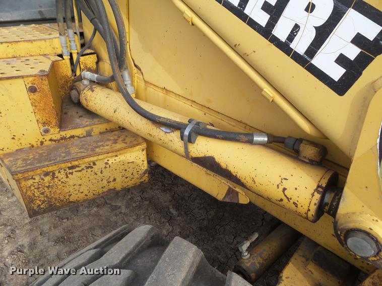 image for item DA7009 1995 John Deere 710D backhoe