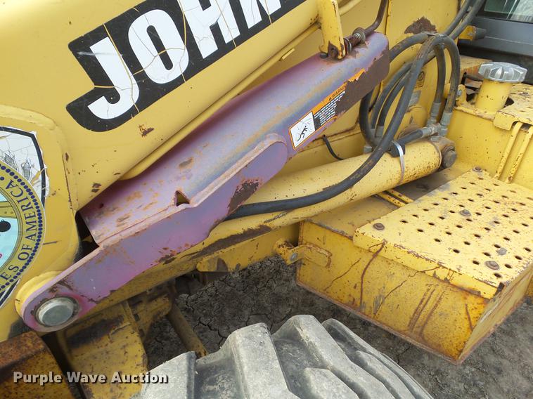 image for item DA7009 1995 John Deere 710D backhoe