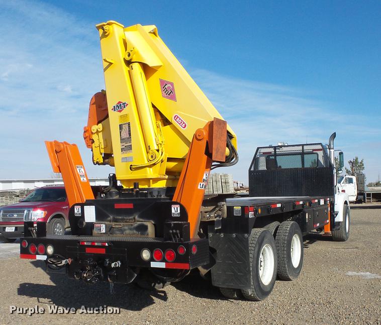 image for item DV9520 1991 Volvo WG flatbed truck with crane