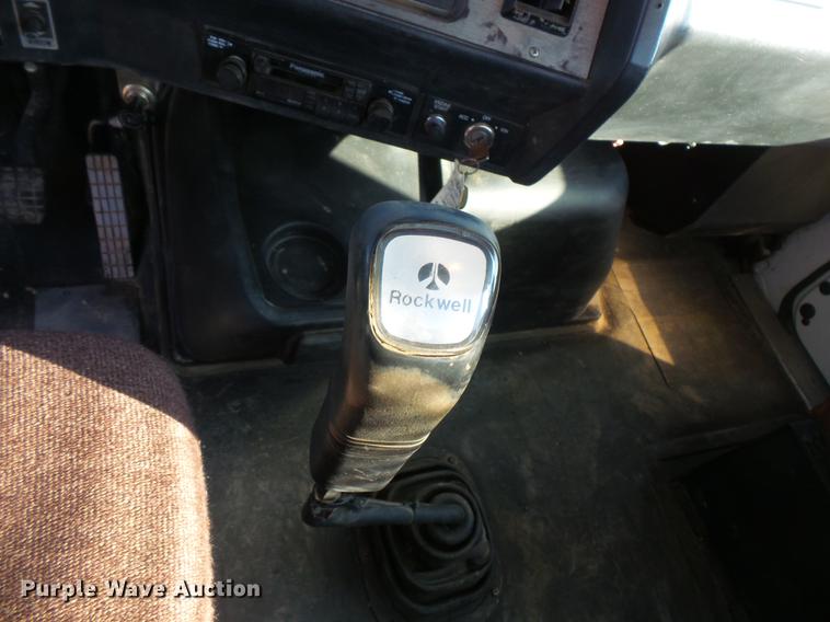 image for item DV9520 1991 Volvo WG flatbed truck with crane