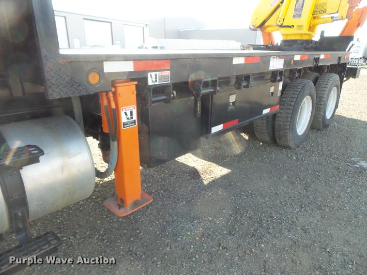 image for item DV9520 1991 Volvo WG flatbed truck with crane