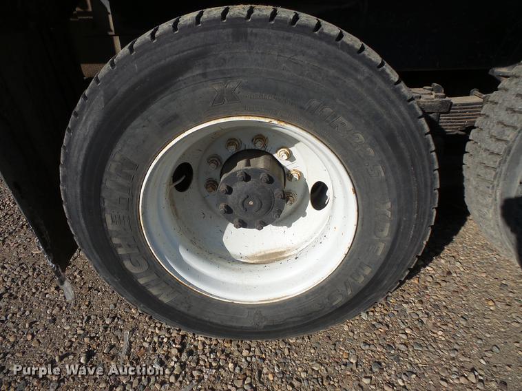 image for item DV9520 1991 Volvo WG flatbed truck with crane