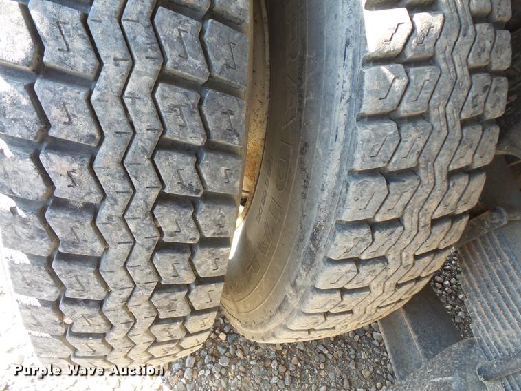 image for item DV9520 1991 Volvo WG flatbed truck with crane