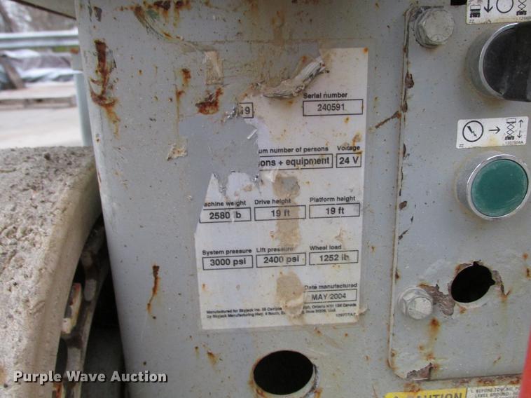 image for item DX9259 2004 Sky Jack SJIII 3219 scissor lift