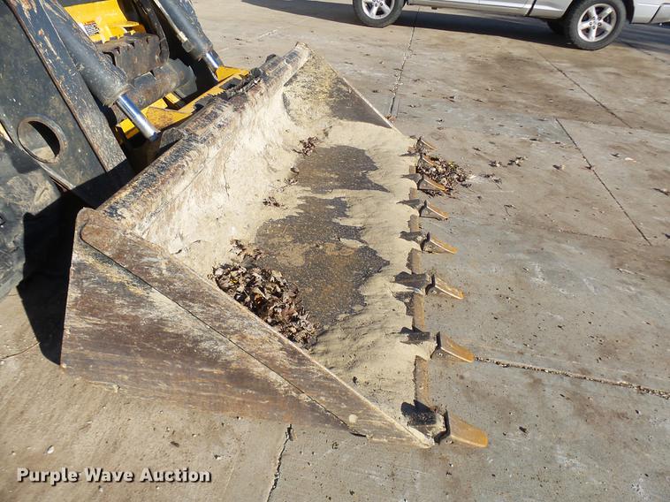 image for item DX9260 2012 John Deere 329D skid steer