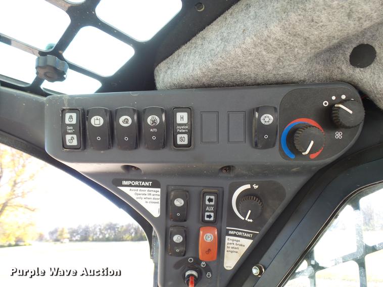 image for item DX9260 2012 John Deere 329D skid steer