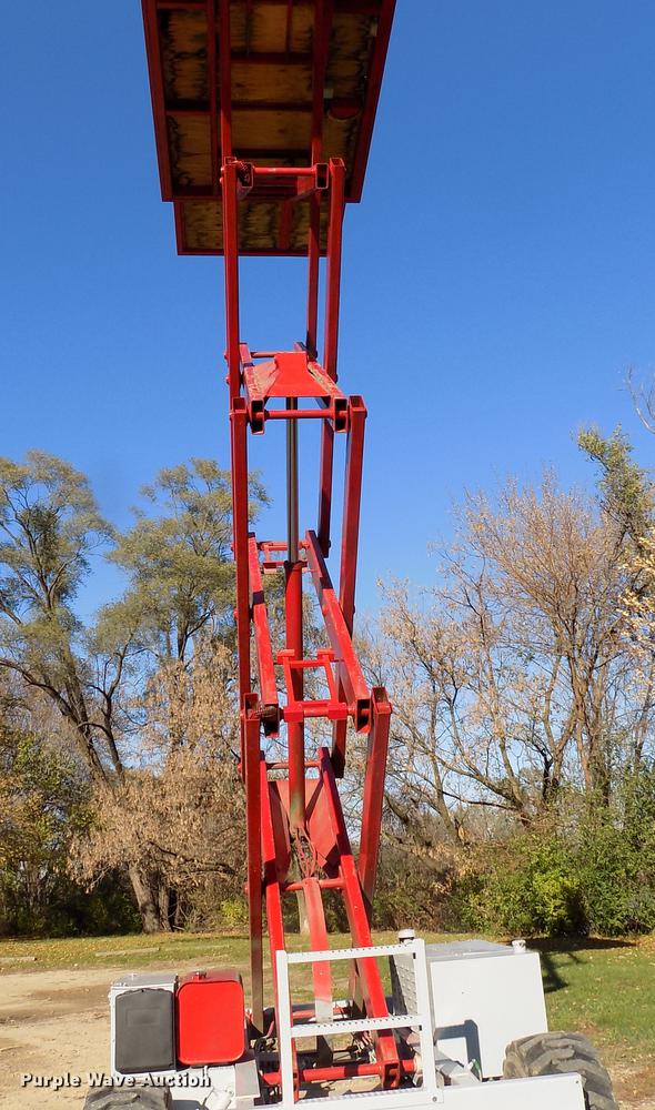 image for item EE9287 1996 Mec 33RT rough terrain scissor lift