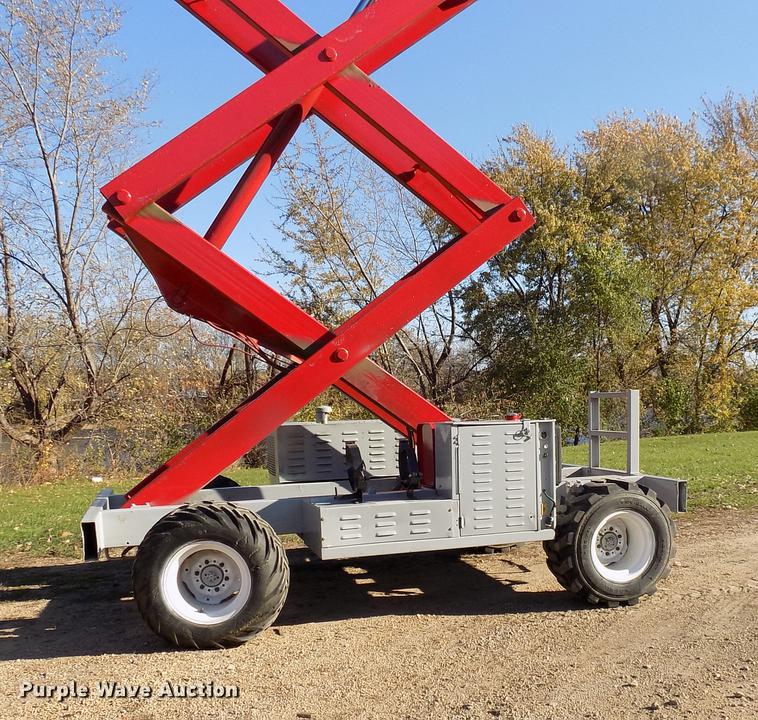 image for item EE9287 1996 Mec 33RT rough terrain scissor lift