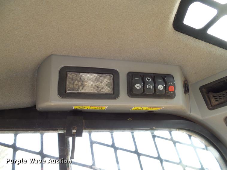 image for item DD1484 2015 Caterpillar 299D skid steer