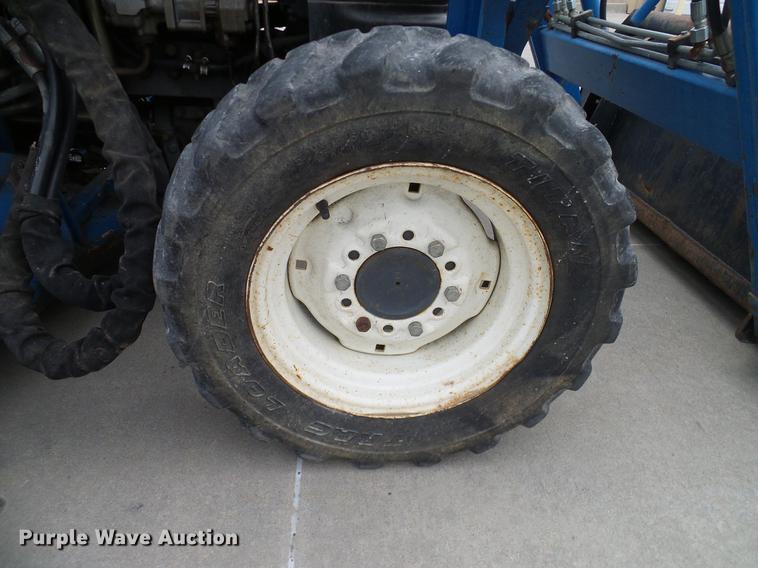 image for item DD1488 1999 New Holland TC29D Deluxe MFWD tractor