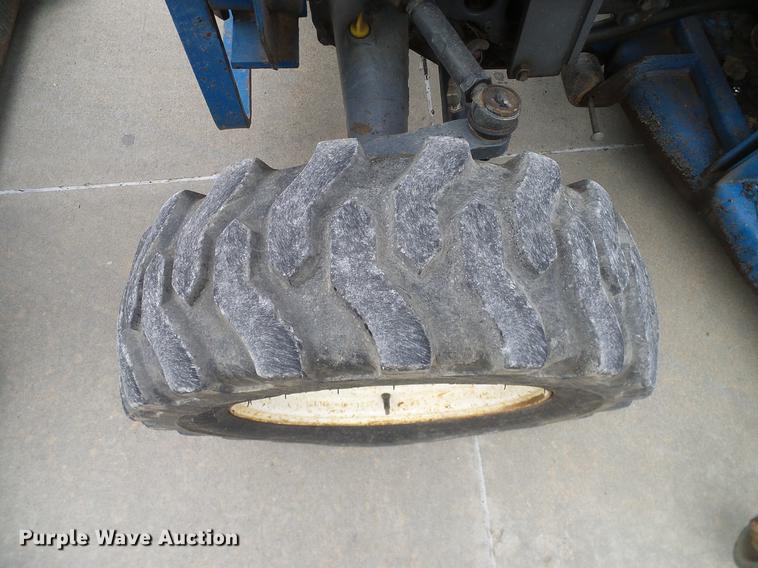 image for item DD1488 1999 New Holland TC29D Deluxe MFWD tractor