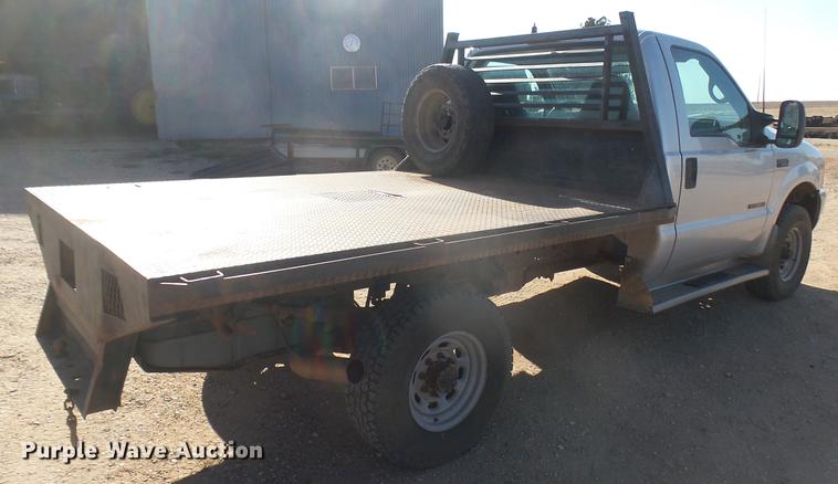 image for item DC1951 2000 Ford F350 Super Duty flatbed pickup truck