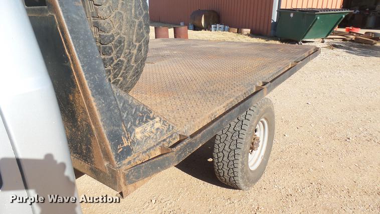 image for item DC1951 2000 Ford F350 Super Duty flatbed pickup truck