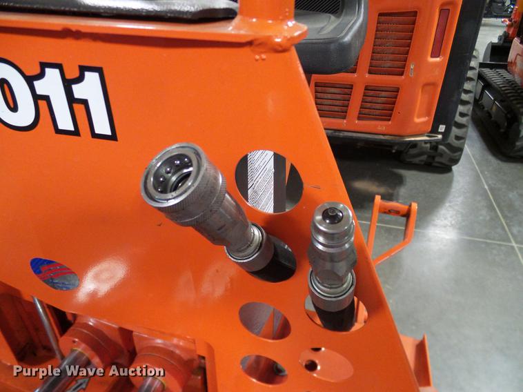 image for item AZ9306 Kubota M4011 backhoe attachment