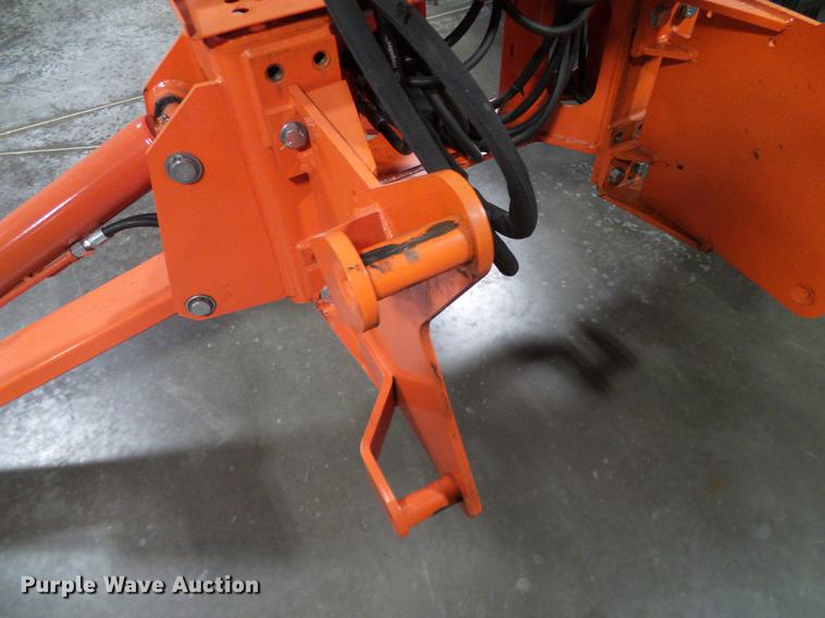 image for item AZ9306 Kubota M4011 backhoe attachment