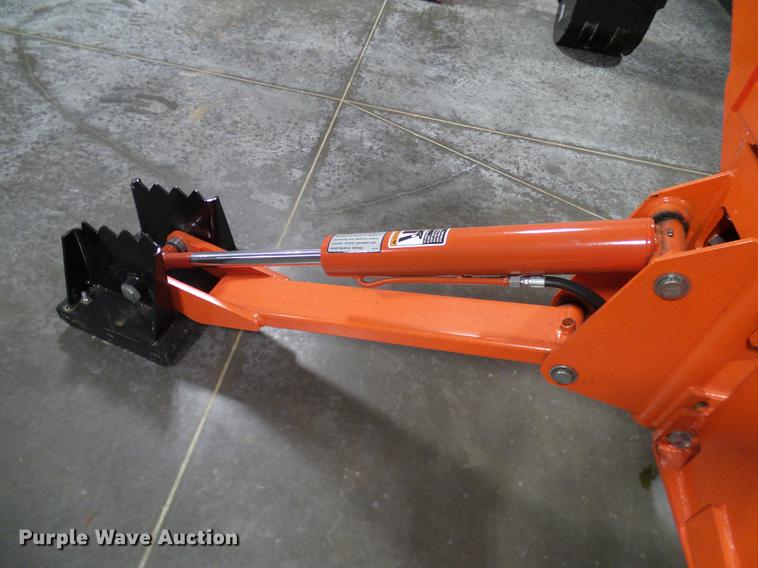 image for item AZ9306 Kubota M4011 backhoe attachment