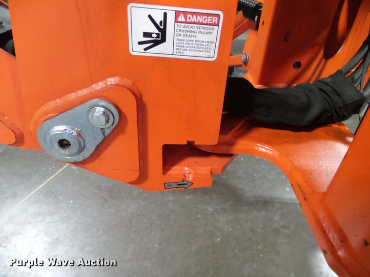 image for item AZ9306 Kubota M4011 backhoe attachment