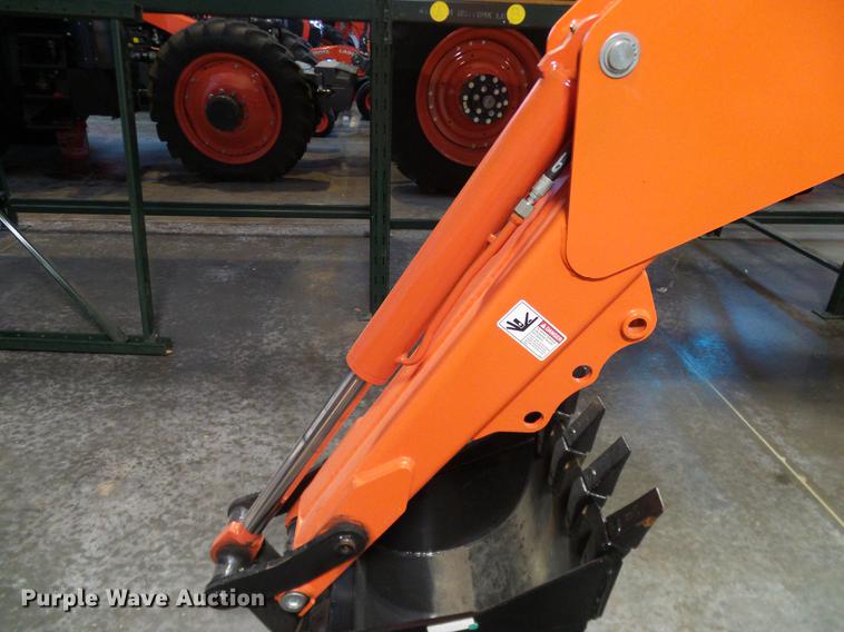 image for item AZ9306 Kubota M4011 backhoe attachment