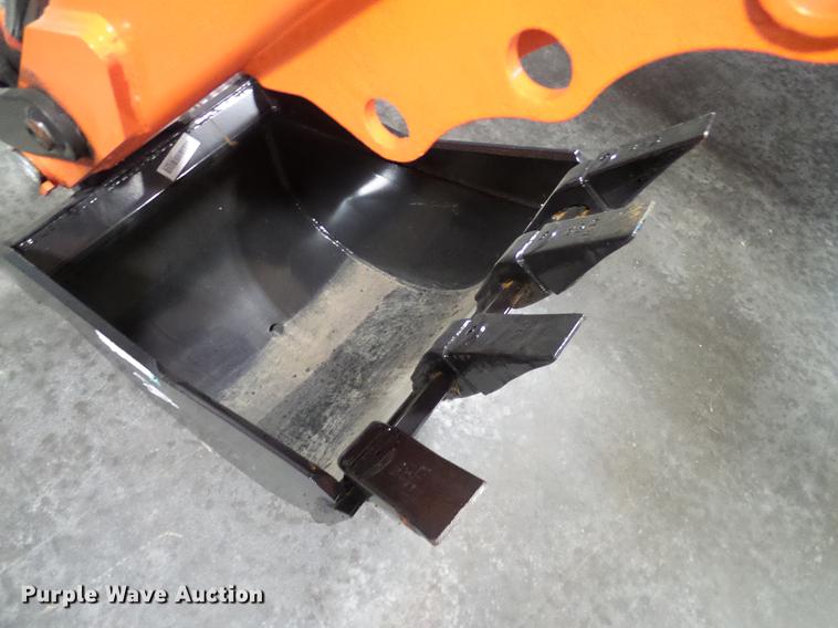 image for item AZ9306 Kubota M4011 backhoe attachment
