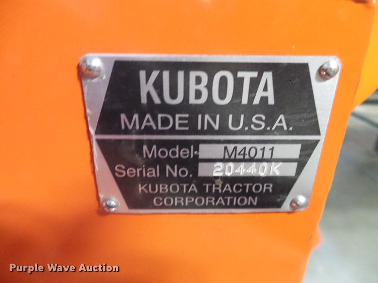 image for item AZ9306 Kubota M4011 backhoe attachment