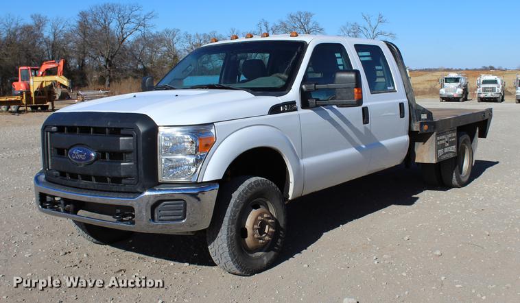 image for item BE9378 2013 Ford F350 Super Duty XL Crew Cab flatbed pickup truck