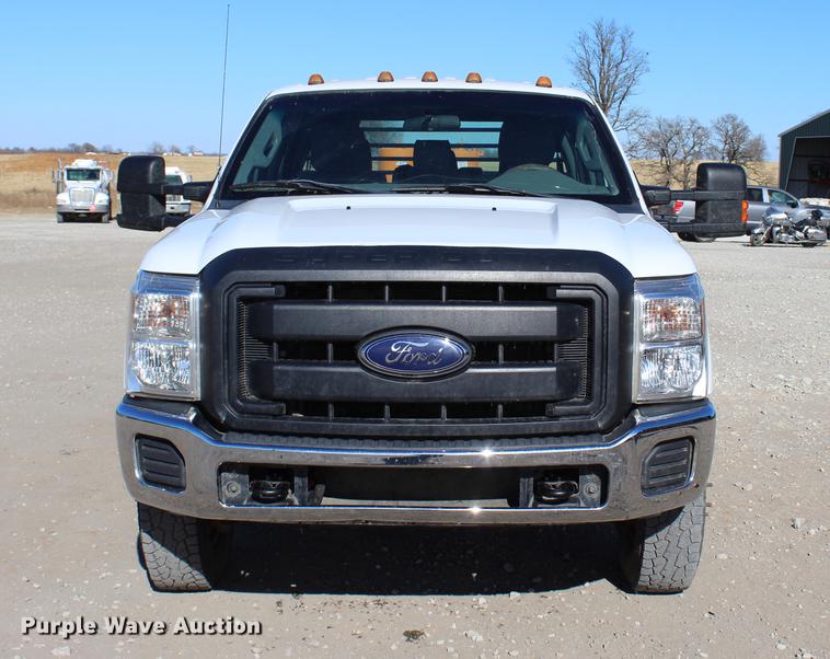image for item BE9378 2013 Ford F350 Super Duty XL Crew Cab flatbed pickup truck