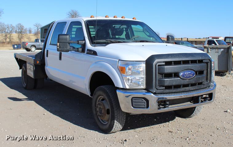 image for item BE9378 2013 Ford F350 Super Duty XL Crew Cab flatbed pickup truck