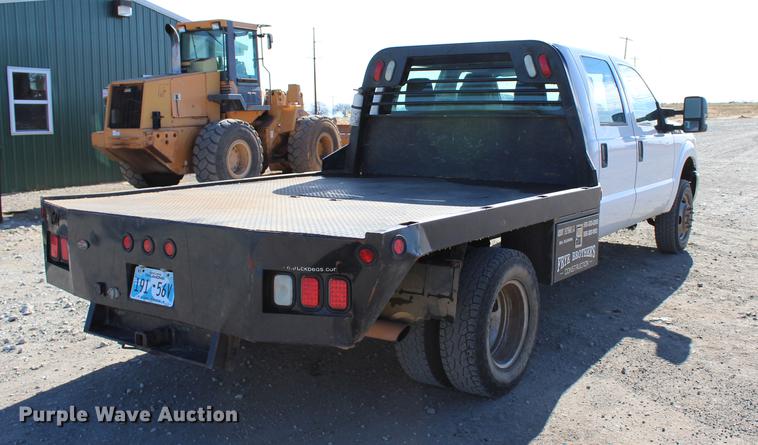 image for item BE9378 2013 Ford F350 Super Duty XL Crew Cab flatbed pickup truck