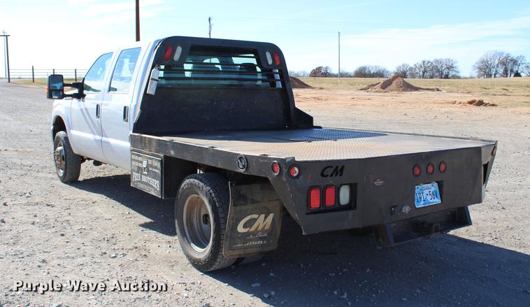 image for item BE9378 2013 Ford F350 Super Duty XL Crew Cab flatbed pickup truck