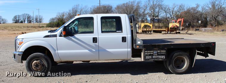 image for item BE9378 2013 Ford F350 Super Duty XL Crew Cab flatbed pickup truck