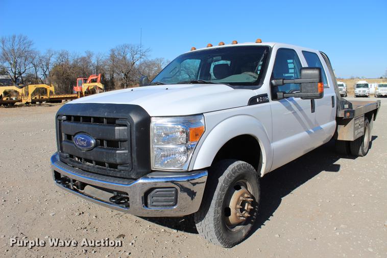 image for item BE9378 2013 Ford F350 Super Duty XL Crew Cab flatbed pickup truck