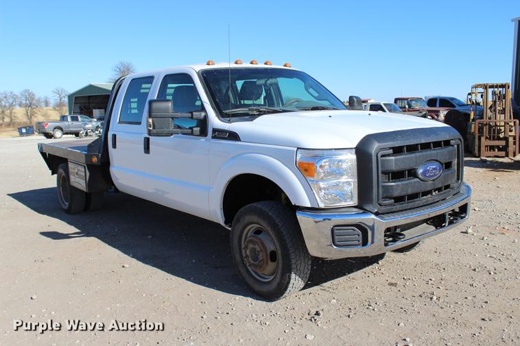image for item BE9378 2013 Ford F350 Super Duty XL Crew Cab flatbed pickup truck