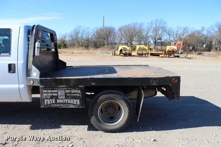 image for item BE9378 2013 Ford F350 Super Duty XL Crew Cab flatbed pickup truck