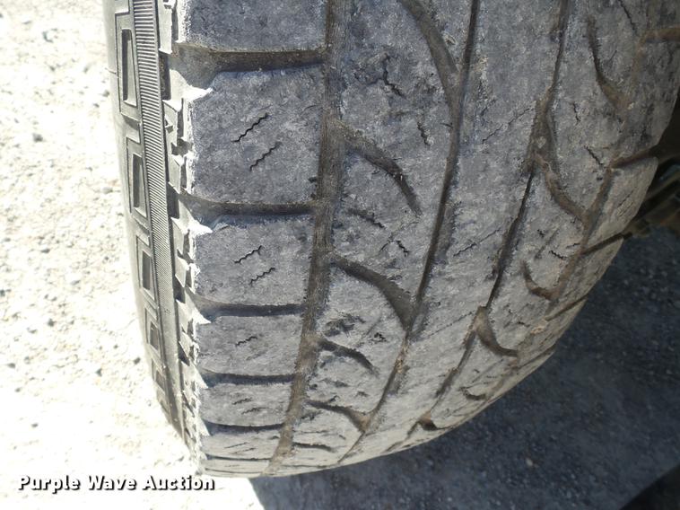 image for item DA2453 2003 Nissan Frontier Crew Cab pickup truck