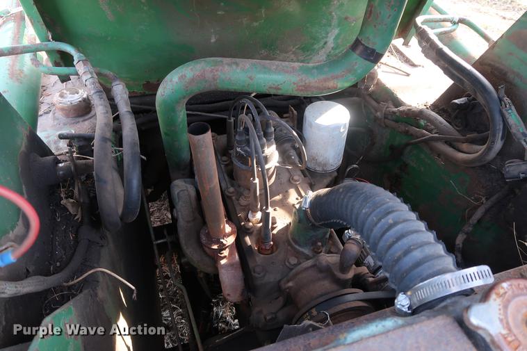 image for item DA8526 John Deere 125 skid steer