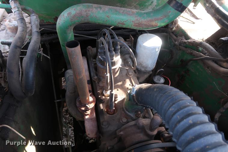 image for item DA8526 John Deere 125 skid steer