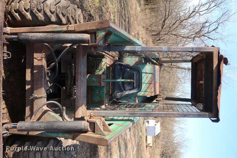 image for item DA8526 John Deere 125 skid steer