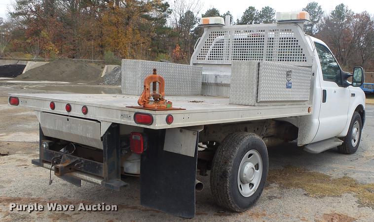 image for item DB7325 2005 Ford F350 Super Duty flatbed pickup truck