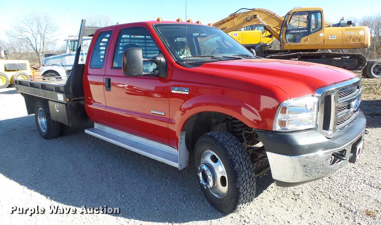 image for item DB9874 2006 Ford F350 Super Duty SuperCab flatbed pickup truck